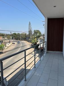 a balcony with a view of a road at Valle Stay in Cedro