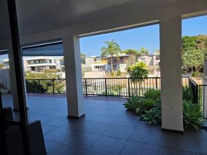 a balcony with a view of a building at Bliss On Pearl Key in Gold Coast