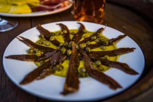 a plate of food with a star pattern on it at Villa Rubin with heated pool in Slivno