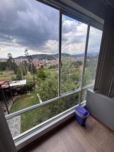 a large window with a view of a city at Cabaña Belvedere in Duitama