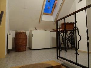 a kitchen with a counter and a table in a room at Quaint Holiday Home in Schmogrow Fehrow in Schmogrow