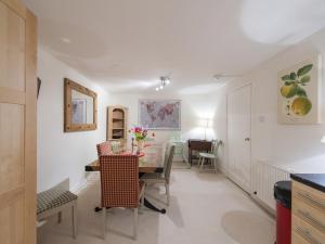 a kitchen and dining room with a table and chairs at 7A - Uk7350 in Edinburgh +13 photos