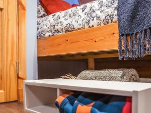 a room with a bunk bed and a white shelf at Chestnut-Uk7586 in Stewarton