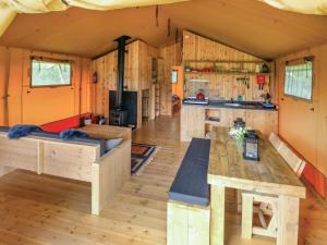 a kitchen and living room in a tiny house at Swallow - Safari Tent - Ukc8985 in Romsey