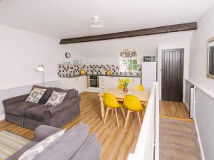 a kitchen and a living room with a table and a couch at Number Two - Ukc4964 in Tawstock +26 photos