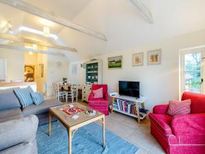 a living room with a couch and chairs and a tv at Thyme Cottage - Ukc6131 in Eastdean