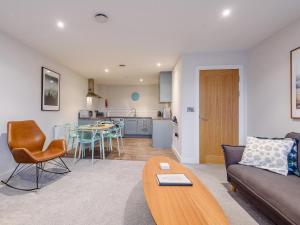 a living room with a couch and a table at 3 Eastgate - Uk34282 in Andover