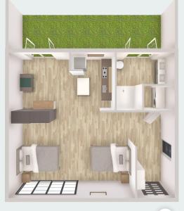 a rendering of a small apartment with a floor plan at INCLUSIVeLOFT in Legnano
