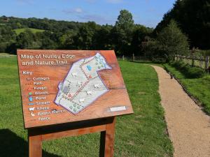 a sign for a map of turkey eye and nature trail at Chestnut Cottage in Uckfield
