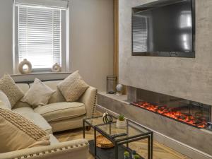 Ruang duduk di Silver Cottage