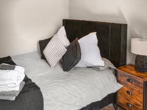 Katil atau katil-katil dalam bilik di Silver Cottage +6 gambar