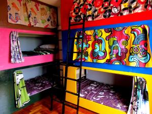 Cama o camas de una habitación en La Casa Azul Hostel