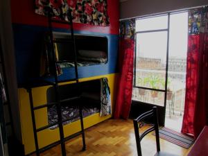 Cama o camas de una habitación en La Casa Azul Hostel