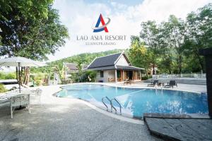 a swimming pool at a la asian resort at Lao Asia Resort Luangprabang in Luang Prabang
