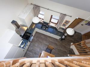 an overhead view of a dining room and a theatre at Laurel Cottage - Ukc6256 in Linlithgow