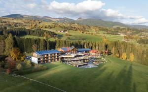 an aerial view of a resort in the mountains at Gut Sonnberghof in Mittersill