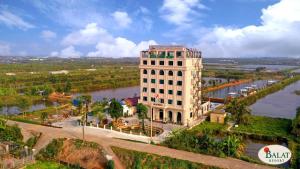 an aerial view of a building next to a river at Balat Resort in Tập Thiện