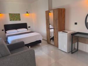 Llit o llits en una habitació de Imbrossa Hotel