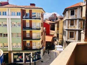 an overhead view of a city street with buildings at Las Alas in Avilés