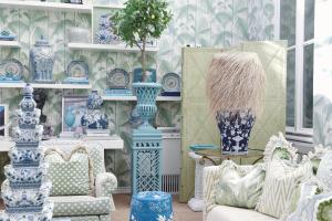 a room filled with blue and white vases on shelves at Hotel Van Cleef in Bruges
