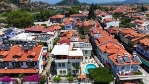 an aerial view of a town with orange roofs at The Dalyan's in Dalyan
