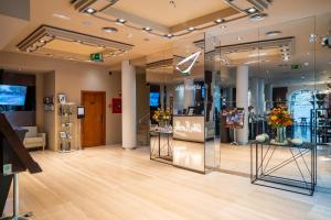 a store with flowers on display in a building at Abba Rambla Hotel in Barcelona