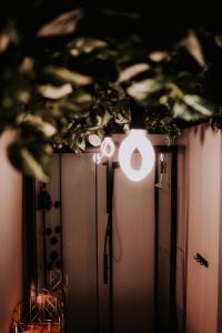 a couple of doors with a light on them at KOHT apartment in Pärnu