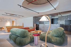 Uma área de estar em Hotel Acta Moa