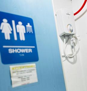 a sign on the side of a hospital room at Daltans Home Stay Siargao in General Luna +89 photos