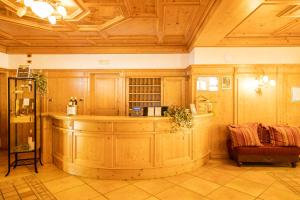 a large room with a bar in a building at Hotel Residence Panorama La Forca, GTSGroup in Tignale +174 photos