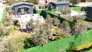 an overhead view of a garden with a house and trees at ON2 Bungalov Villas 2 in Antalya