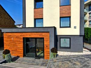 a house with a large glass door at Tlenoterapia in Białystok