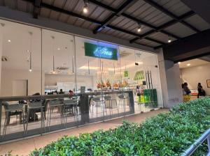 a restaurant with a bar in a shopping mall at The City Escape in Cebu City