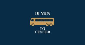 a yellow school bus with the words min to center at Ljubljana Resort Hotel & Camping in Ljubljana