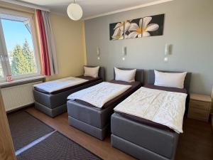 Llit o llits en una habitació de Hotel Sieme