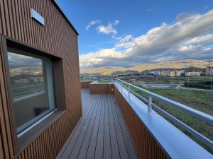 a balcony of a building with a view of the mountains at Hotel Floris in Rende