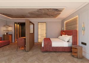 a bedroom with a bed and a desk in a room at Palacio San Juan, a Royal Hideaway Hotel in Murcia +17 photos