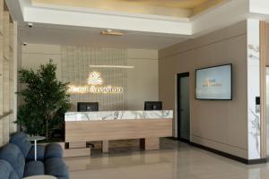 a lobby of a hotel with a reception desk at Hotel Anselmo in Boca Chica +90 photos