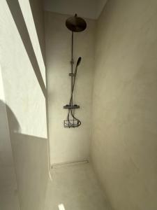 a room with a light fixture on the wall at Villa Francine in Deinze +27 photos