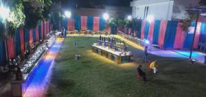 an overhead view of a stage in a building at night at G d palace in Gwalior