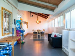 a living room with a couch and a table at Paço no Monte by Stay ici in Montargil