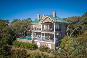 an aerial view of a house with a swimming pool at 15 Ocean Course in Kiawah Island
