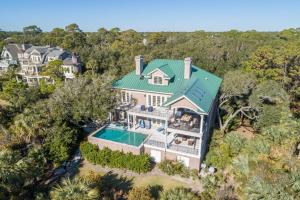 an aerial view of a house with a swimming pool at 15 Ocean Course in Kiawah Island