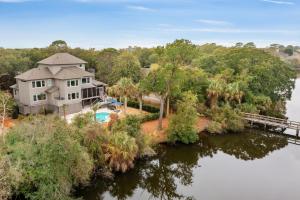 an aerial view of a house on the water at 3 Surfsong in Kiawah Island