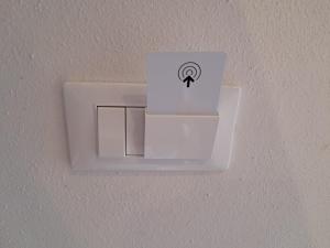 a lightswitch on a wall with a light on it at Villa "LE GILDA" 5 STELLE in Massa