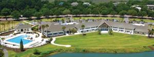 an aerial view of a large house with a swimming pool at 2455 The Bent Twig in Seabrook Island