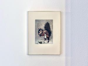 a picture of a dog on a wall at Sonnenhof Seeg 08 in Seeg