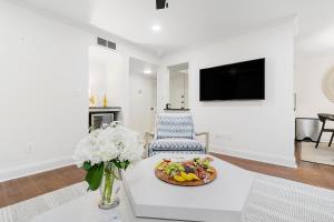 a living room with a table with a bowl of food at 5537 Green Dolphin Way in Kiawah Island