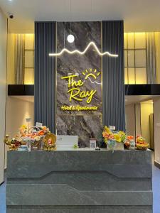a lobby with a sign that reads the ray therapists conference at The Ray Hotel & Apartments in Phnom Penh