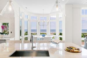 a kitchen with a view of the ocean at 38 Surfsong in Kiawah Island